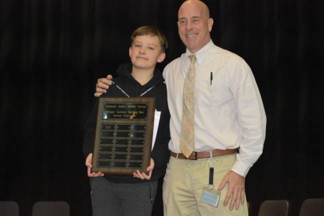 ‘Show-off time’: 31 rounds marks district spelling bee record DVMS spelling bee champion Wyatt Malenczak and Principal Dr. Pete Ioppolo.