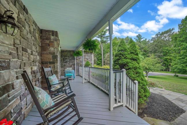 Modern, elegant four-bedroom home with privacy and a pool Porch