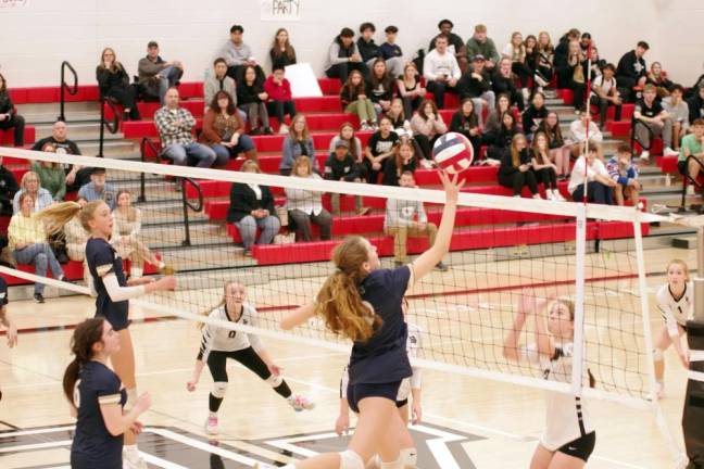 The Spring-Ford Rams (foreground) and the Delaware Valley Warriors face each other on the court.