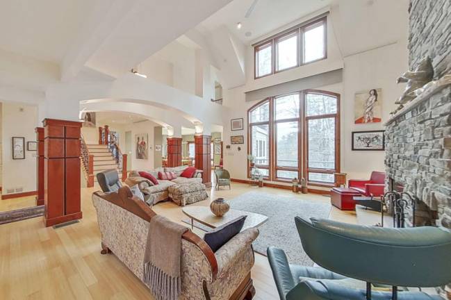 Custom designed home is a hidden gem on 75 acres Custom designed home is a hidden gem on 75 acres