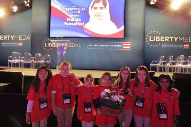 Hope for a better world Grace Lee, Jules Meeler, Helaina Stefaniak, Stella Weir, Trinity Long, Isabella Anderson, Nuria Bary just before flowers were presented and ceremony began. Malala stepped out on stage and waved from beside the podium just minutes after this photo was taken.