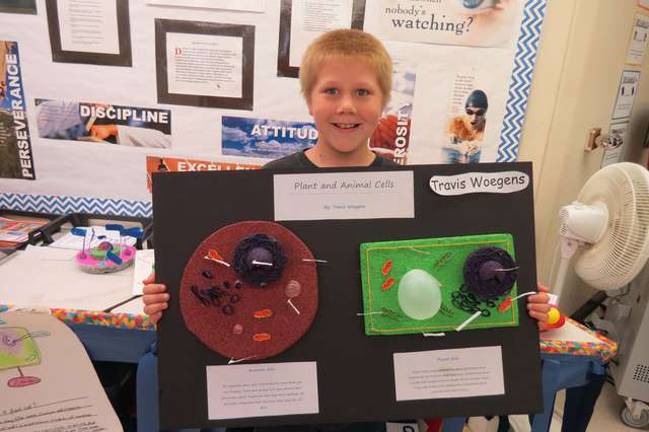 Fifth grade creative scientists Travis Woegens.