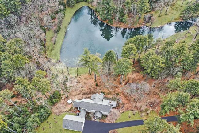 Custom designed home is a hidden gem on 75 acres Custom designed home is a hidden gem on 75 acres