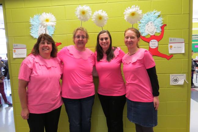 Seuss on the loose at DVES From left: fourth-grade teachers Mrs. Thompson, Mrs. Navitsky, Mrs. Genovese, and Ms. Casey (Photo by Peg Snure)