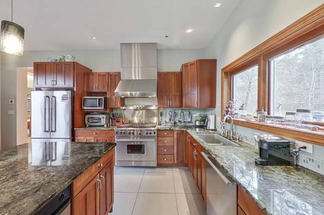 Custom designed home is a hidden gem on 75 acres Custom designed home is a hidden gem on 75 acres