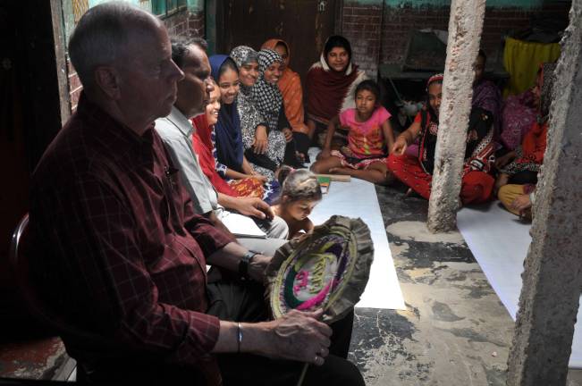 After world odyssey, a couple comes back home Edson Whitney with a women's support group (Photo provided)
