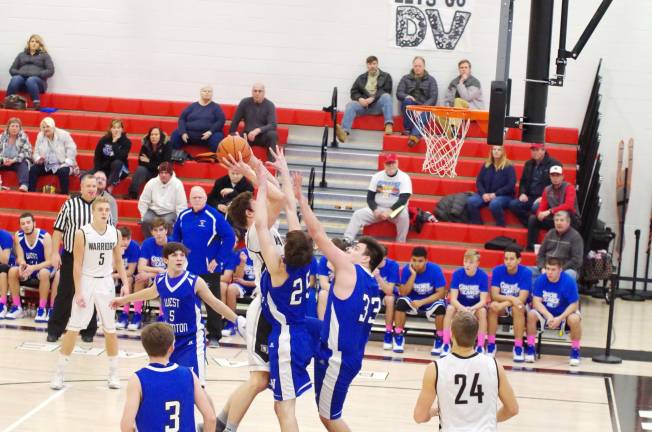 Delaware Valley Warriors meet West Scranton Invaders in 'Court Battle' A Delaware Valley shooter attempts a shot against tight West Scranton coverage. (Photo by George Leroy Hunter)