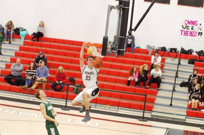 DV Warriors defeat Minisink Valley in holiday tournament Delaware Valley Warrior Shane Acoveno dunks the ball in the third period. Acoveno scored 13 points.