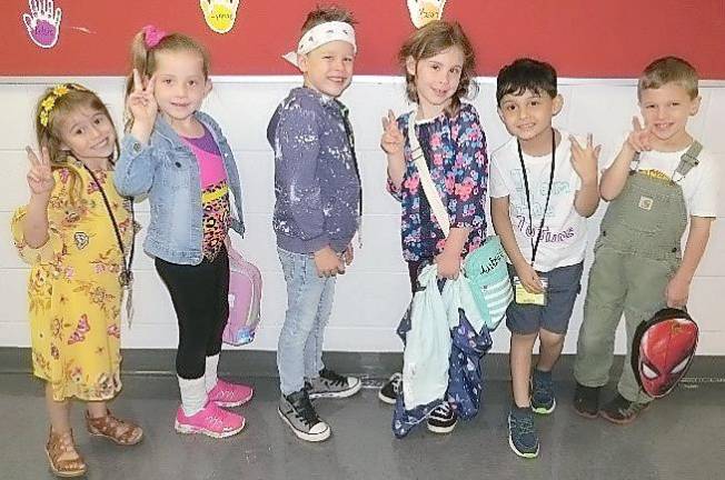 From left on '70s and '80s day: Myleigh Lewis, Lynnae Kresse, Cassius Khan, Aubrey Becker, Kaiden Rupp, and Russell Fowler