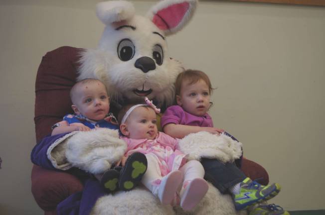 Easter egg hunt From left siblings Hunter (9 months), Baylee (9 months) and Dakotah McBride (21 months) of Milfordpose with the Easter Bunny.