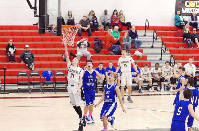 Delaware Valley Warriors meet West Scranton Invaders in 'Court Battle' Delaware Valley’s Blake Gearhart glides with the ball towards the basket. Gearhart scored 12 points. (Photo by George Leroy Hunter)