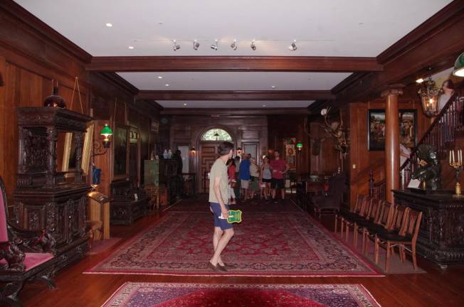 Visitors take a tour of the mansion.