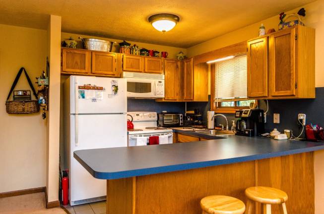 Tri-level chalet has prime lakefront location Kitchen