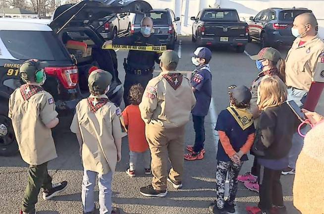 Cub Scout Pack 298 meets with Ogdensburg police chief Chief Gordon explains police work (Photo provided)