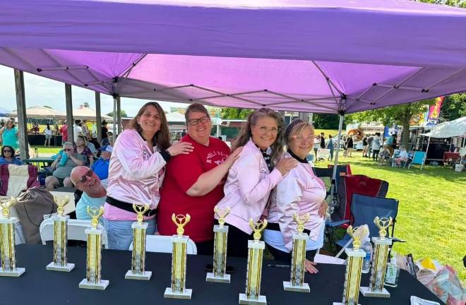 Fabulous Fifties return The Pink Ladies and their trophies.