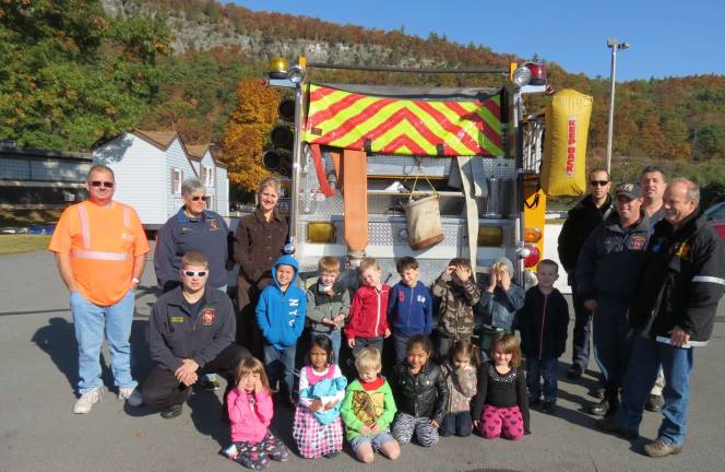 Firefighters simulate smoke house Photo provided Pictured from left with Zegarski and visiting firefighting crew are: (back row) Colton Eckert, Jacob Schmick, Ryan Sinclair, Cayden Dombrosky, Jude Yost, Nicholas Actisdano and Rylan Rinaldo. (front row) Makayla Colon, Zara Shahee, Christopher Laube, Isabella DeMeo, Brianna Doran and Avah Galimi.