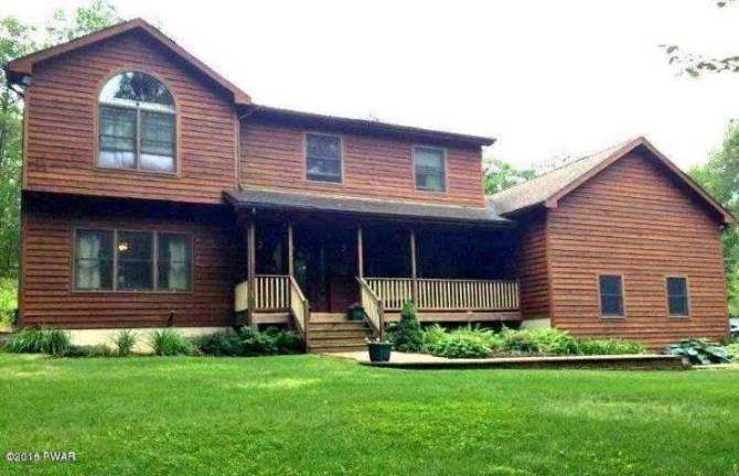 Four-bedroom farmhouse on quiet country road Four-bedroom farmhouse on quiet country road
