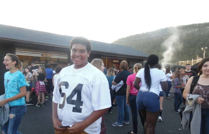 That Warrior spirit Freshman Quadre Posey, who plays football for DV Middle School, came to support the high school team (Photo by Melissa McMonagle)