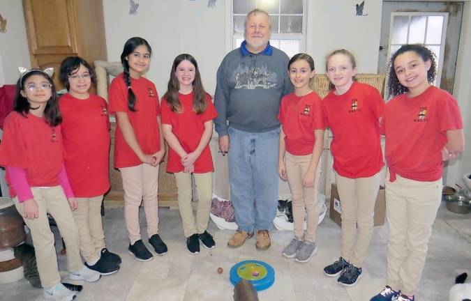 From left: Marilyn Marty, Sarah Gilpin, Atisha Joannou, Keria LeMay, Mr. Heim, Rylee Nitecki, Layla Garrity, Paris Machado