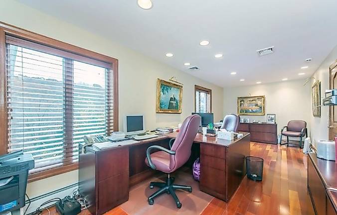Custom estate includes car charging station, hot yoga room, and frescos Custom estate includes car charging station, hot yoga room, and frescos