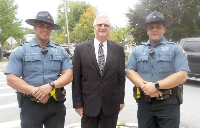 From left: Deputy Chris Colella, Sheriff Kerry Welsh, and Deputy Ryan Fuller before the remembrance ceremony. (Photo by Frances Ruth Harris)