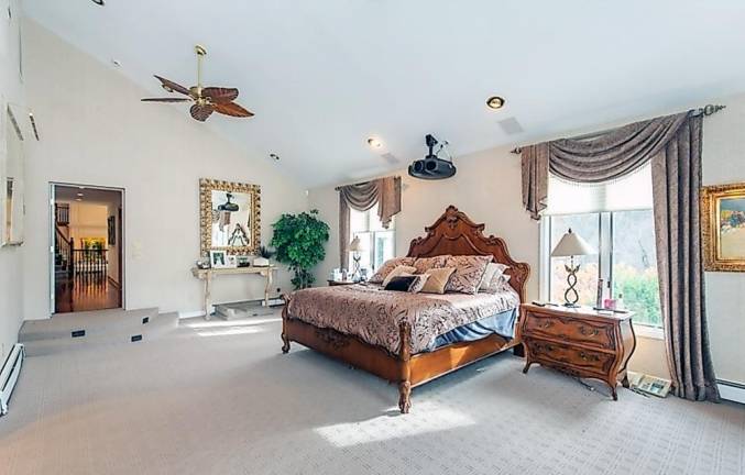 Custom estate includes car charging station, hot yoga room, and frescos Custom estate includes car charging station, hot yoga room, and frescos