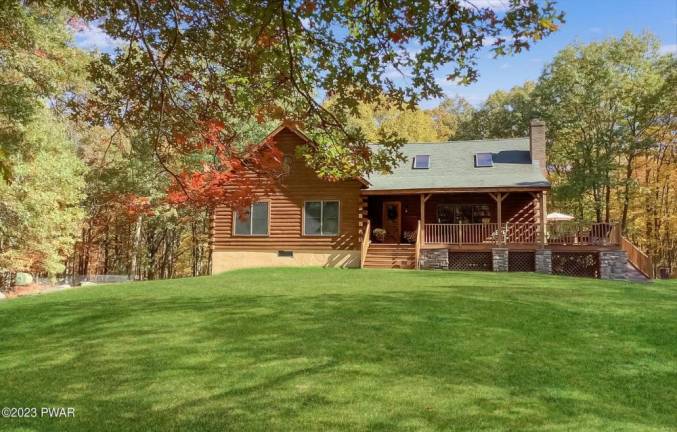 Modern and efficient log home nestled in the woods Modern and efficient log home nestled in the woods