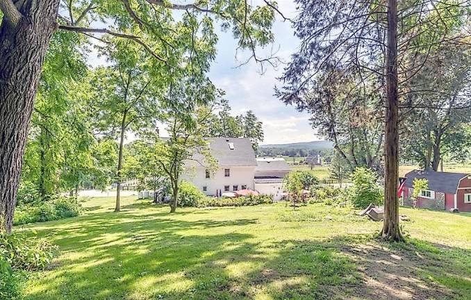 Old world charm abounds in this updated farmhouse