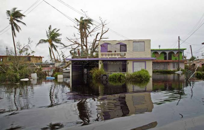 Ravaged Puerto Rico: Here's how to help after hurricane The community of Mini Mini flooded after the Carraizo Dam released water, due to the overflow brought by Hurricane Maria. The category 4 hurricane tore through Puerto Rico on September 20 (FEMA photo by Yuisa Rios)