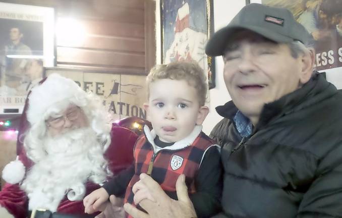 Santa, Thomas Nani, and his grandfather Thomas Nani