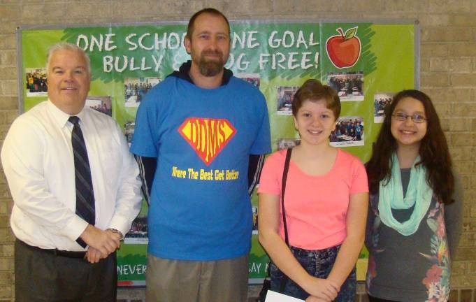 'Mr. Z' and Mrs. Bachman voted top teachers at DDMS Pictured from left: Principal James Mitchell, William Zalewski, Leann Norman, and Calista DiPrima (Photo provided)