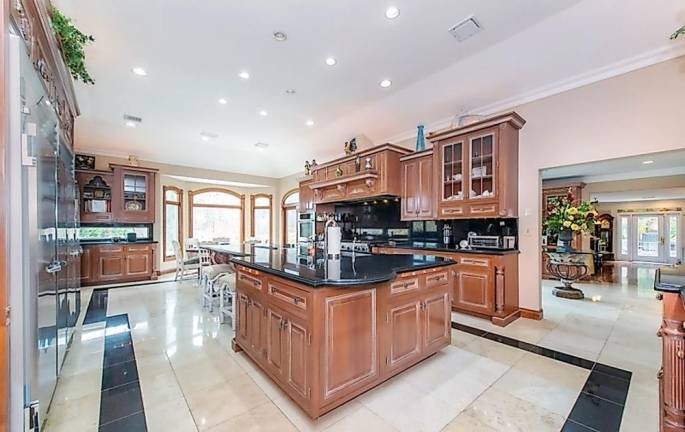 Custom estate includes car charging station, hot yoga room, and frescos Custom estate includes car charging station, hot yoga room, and frescos