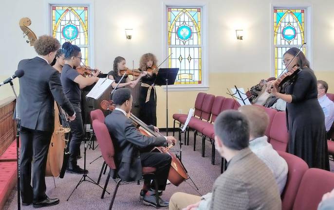 Warwick. Dr. King’s message: ‘Doing something’ to promote love and equality for all E’Lissa Jones and The Ebony Strings.