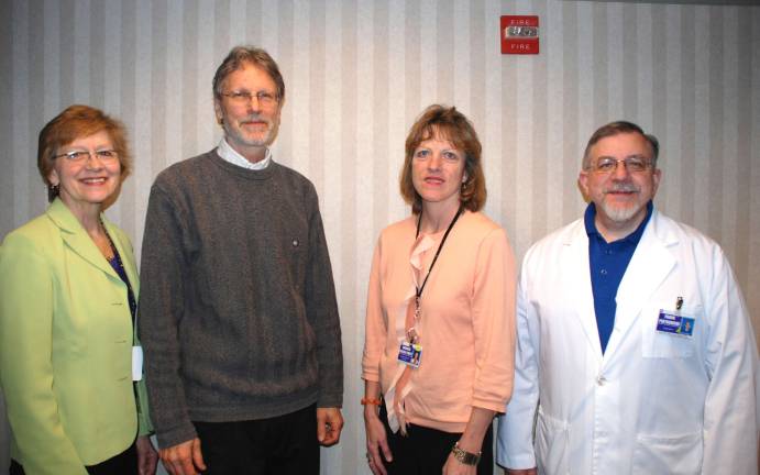 Learn how to manage pain without opioids Donna Decker, RN, series organizer behind free pain management workshops at Wayne Memorial Hospital poses with three of the 13 presenters: Patrick Klein, Barbara Griggs-Pratt, and Frank Piotrowski (Photo provided)
