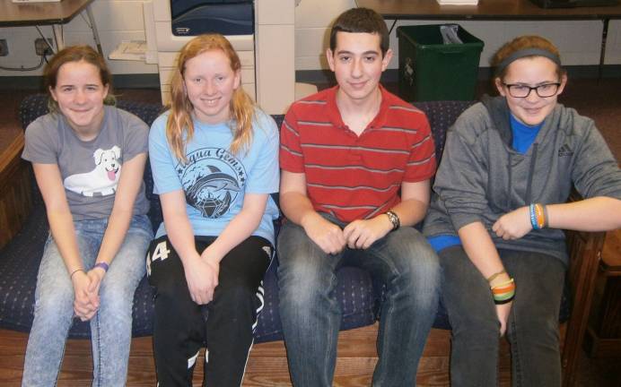 Angels collect instruments for children in need Odyssey Angel team members (from left): Elizabeth Morris, Marisa Dambach, Nicholas Asprea, and Kelly Morris (Photo provided)