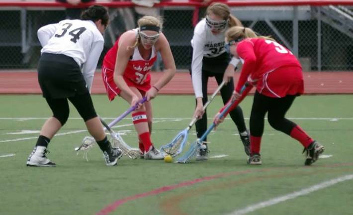 DVH Warriors defeat Hazleton Cougars in Girls Varsity Lacrosse Delaware Valley Warriors and Hazleton Cougars battle for the ball