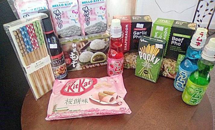 Chopsticks, garlic teriyaki sauce, seaweed snack, green tea Mochi, garlic pho, beef pho, Cherry Blossom Mochi KitKats, strawberry Ramune, green tea Pocky, blueberry Ramune, melon Ramune (Photo provided)