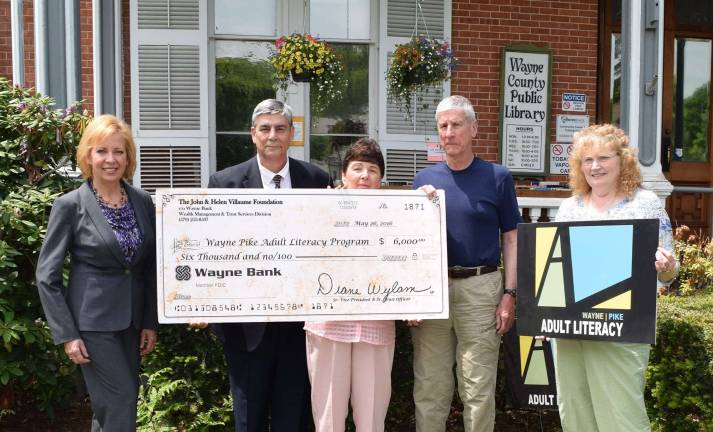 Pictured (from left): Diane Wylam, Sr. Vice President/Sr. Trust Officer, Wayne Bank-Wealth Management and Trust Services, David J. Sutton, Executive Director for Wayne Pike Adult Literacy Program, Annette Petry, Board President for Wayne Pike Adult Literacy Program, Jon Villaume, Villaume Foundation board member, and Elizabeth Wilson, Wayne Pike Adult Literacy Program board member (Photo provided)