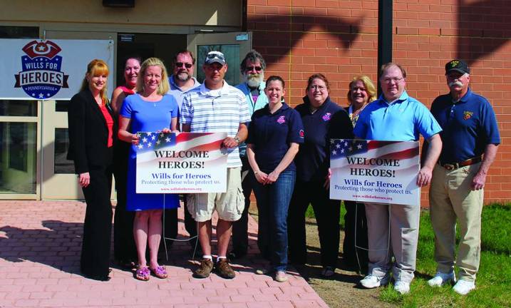 Pike County Bar provides free wills to 1st responders From left, Kelly Gaughan, Esq., officer, Pike County Bar Association; Karen Wilshinsky, Esq.; Elizabeth Burton, Esq., program coordinator; David Trevaskis, Esq.; Matthew Galassso, Esq.; Robert Reno, Esq.; Hannah Suhr, Esq.; Gabriele Miller-Wagner, Pennsylvania Bar Association; Elizabeth Erickson Kameen, Esq., president, Pike County Bar Association; Mark Moulton, Esq.; and Rich Caridi, county commissioner.