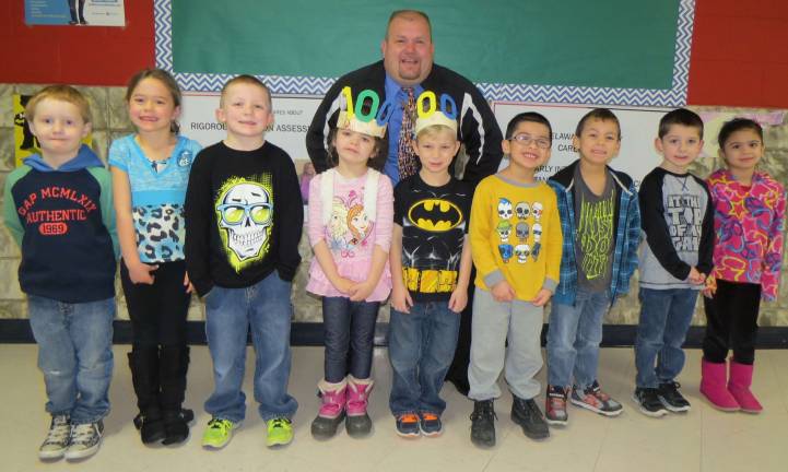 Top kids for January Kindergarten Students of the Month: Logan Clarke, Josephine Lordi, Dylan Bannon, Shannon O'Leary, Drew Churchill, Anthony Parades-Nieves, Mason Barker, Jordan Maroney and Marilyn Marty with DVES Principal Aaron Weston.