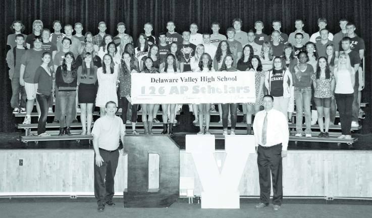 Largest number of DVHS students named AP Scholars in school history Pictured: Delaware Valley AP Scholars (current seniors) first row from left: Jay Tucker, DV Counseling Department Chairperson and Ronald Collins, DV High School Principal. Second row: Jessie Wagenhoffer, Paige Sehring, Maranda Zinn, Morgan Mallon, Katie Krause, Reena Mia, Claudia Alvarez, Jamie McKeon, Samantha Buldo, Anna Cutaia, Julie Perosi, Ramonda Giddings, Annmarie Mullen, Danielle Misiaszek. Third row: Anthony Kivler, Zachary Philpot, KristenHupfer, YakiraMirabito, Audrey Djiya, Allison Cerisano, Kristina Zekic, Erin Corry, Nicole McTernan, Zoe Workstel, Amanda Tomik, Emily Belsterling, Adriana Ellison, Kaitlin Corson, Zachary Smickle. Fourth row: Austin Rufano, Dustin DeVilliers, Adrian Zebrowski, Dominique Marcial, Courtney Krauss, Kate Hammond, Emily McKinney, Jonathan Caglianone, Drew Nielsen, John Arnita, Daniel Favaro, Joshua Edelman, Wyatt Karch, Jesse Muniz, Mathew Protsko, Tyler Master. Fifth row: Tyler Mutzek, Lance Larsen, DimitriHrissohoidis, Richard Selneck, Alexander Testino, Victor Naturale, Dylan Brown, John Fagan, GianGelormino, Nicholas McIntyre, Luke Reno, Dominic Montemarano, Christian Chelak, Robert Crawford, Luke Riexinger, Daniel Kurtzman. AP Scholars who were members of the “Class of 2012” are not shown due to the fact they have already matriculated to college when the College Board released the award announcement. Current seniors missing: Martin Strenk, Carla Centanni, Cody Exposito, Mario Marroquin and David Sahagian.