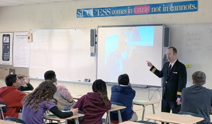 Eighth-graders learn from the pros about the world of work Timothy Gladson, airline pilot