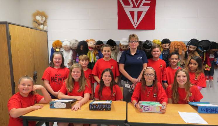 DVES reporters interview Salvation Army captain Pictured in the back row (from left): Lauren Ford, Draven Nitecki, Rozlin Jones, Captain Kelly, Kieran Smith, Kyle Marsh, Irene McDermott. Front: Samara Thompson, Josalyn Legato, Carrigan McCormack, Rhayna Simpson, Gabriella Aitken. (Photo by Peg Snure)