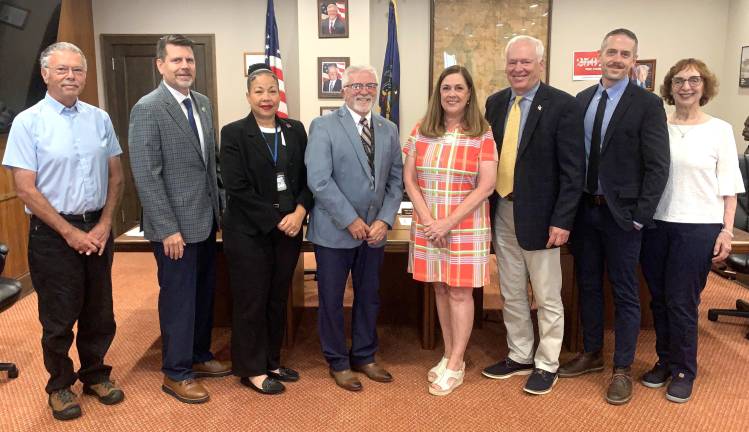 Foundation receives funding for future hospital From left: Pike Medical Foundation Committee Member Charlie Gillinder, Rep. Jeff Olsommer, Pike County Commissioners Christa Caceres and Matthew Osterberg, Sen. Lisa Baker, Pike County Commissioner Ronald Schmalzle, Greater Pike Community Foundation Executive Director Rick Little; and Greater Pike Community Foundation Jacqueline Damian. (photo provided)