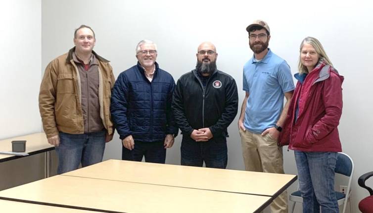 L-R: David Weber of Stone Furniture, Commissioner Matthew Osterberg, Veterans Affairs Director Jesiah Schrader, Joe Barth of VetStock, and Veterans Affairs Deputy Director Karen Olson.