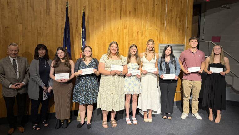 Students receive almost $27K in scholarships Paul Brislin of the Pike Chamber (left) and Regina Thoenig for the Amanda Nicole Thoenig Memorial Scholarship Fund with some of the 2025 Greater Pike Community Foundation scholarship recipients.