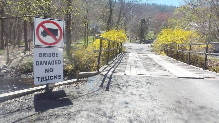 The private bridge is owned by Babette Wright Smith, who lives in the first house on the right on the Dingman side. (Photo by Frances Ruth Harris)