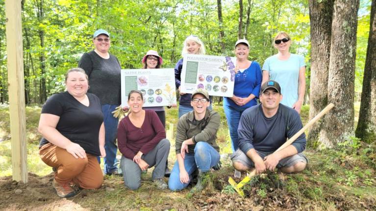 The partners on planting day at the pollinator garden.