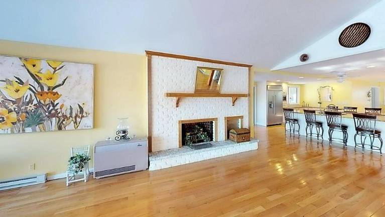 Custom three-bedroom contemporary lakefront with private dock Fireplace