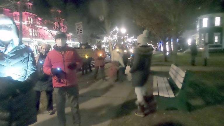 Participants carried lighted candles (Photo by Frances Ruth Harris) (Photo by Frances Ruth Harris)